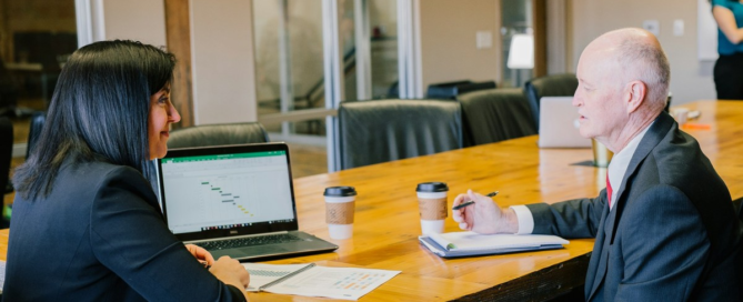 Accomplished leader engaging with their executive coach to continue developing their capabilities